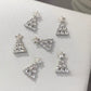 nail charms, charm nails​, nail art charms​, charms on nails, christmas nails, christmas nail art​